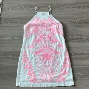 White dress with hot pink tribal Aztec embroidery